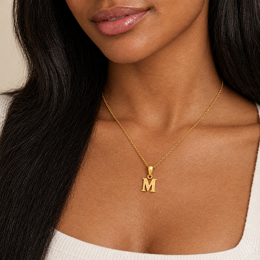 Jules Gold Initial Charm Necklace — close-up